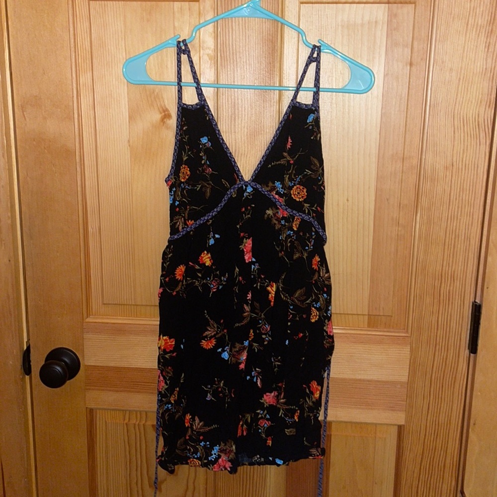 Low cut black dress with flowers